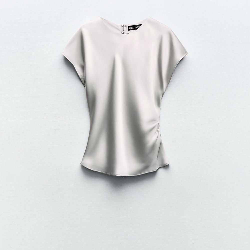 Silver silk round neck top with short sleeves. ZARA